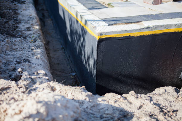 Professional Waterproofing technician working in Secaucus, NJ